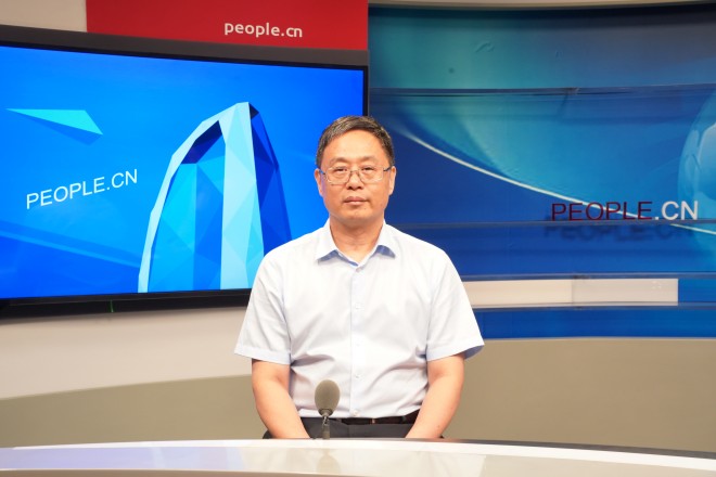 中國藝術研究院院長、黨委副書記周慶富做客人民網。張力洋攝